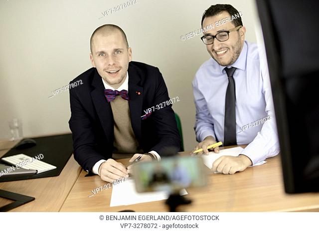 business men at conference, lawyers consulting at online live stream, in Cottbus, Brandenburg, Germany