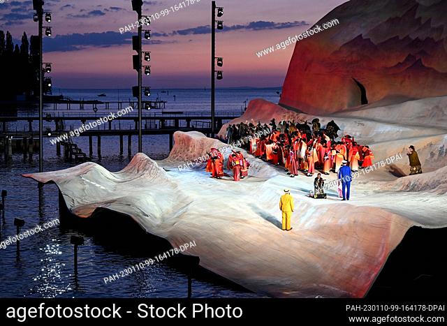 15 July 2022, Austria, Bregenz: Actors act during the photo rehearsal on the lake stage of the Bregenz Festival. The opera Madame Butterfly by Giacomo Puccini...