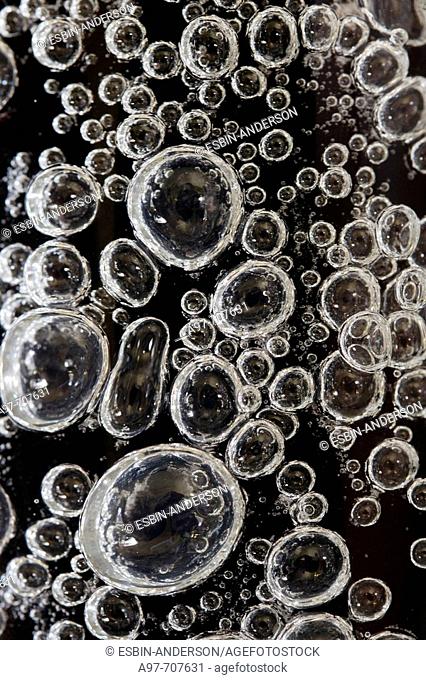 Close-up of air bubbles in glass vase