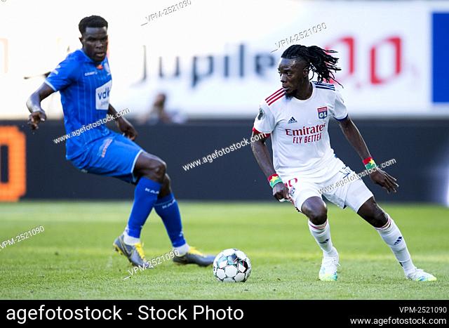 Gent's Michael Ngadeu Ngadjui and Lyon's Bertrand Traore fight for the ball during a friendly soccer game between Belgian first division team KAA Gent and...