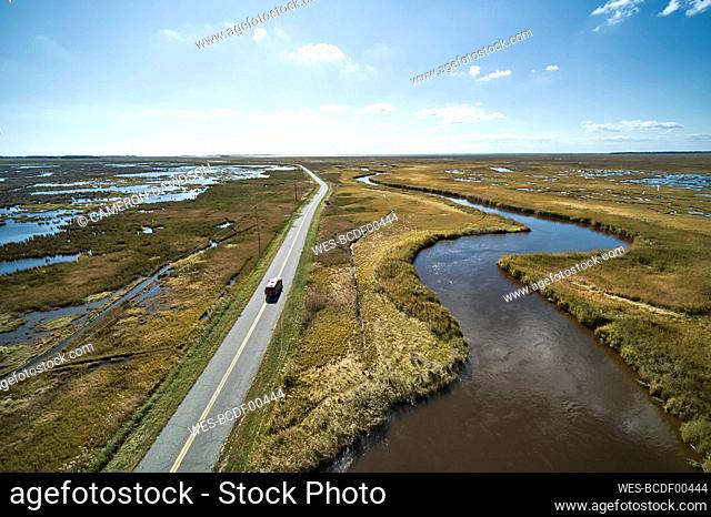 USA, Maryland, Drone view of road stretching across marshes along Nanticoke River on Eastern Shore
