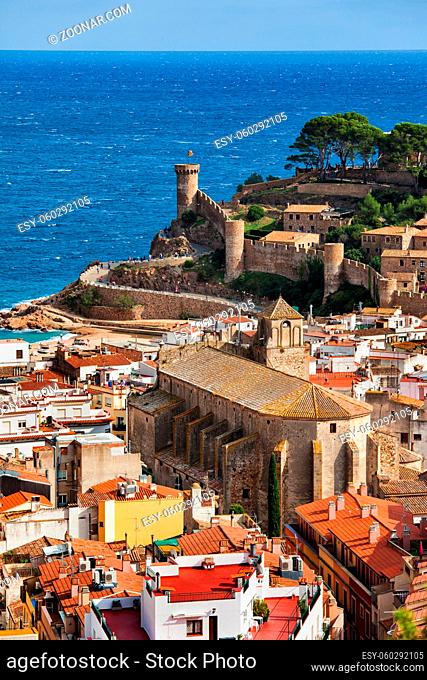 Tossa de Mar seaside town on Costa Brava in Catalonia, Spain, townscape with Parish Church of Saint Vincent