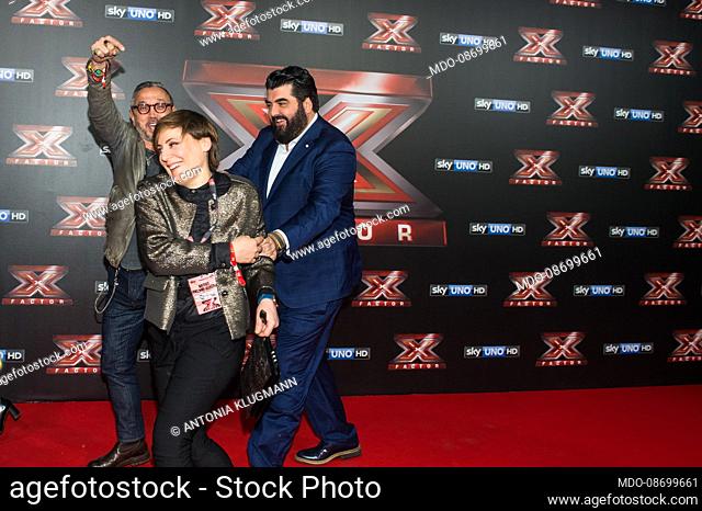 The chefs Bruno Barbieri, Antonino Cannavacciuolo and Antonia Klugmann at the red carpet for the final of the X Factor television program at the Assago Forum