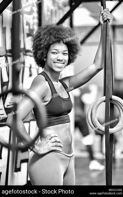 Premium Photo  African american athlete woman workout out arms on dips  horizontal parallel bars exercise training triceps and biceps doing push ups