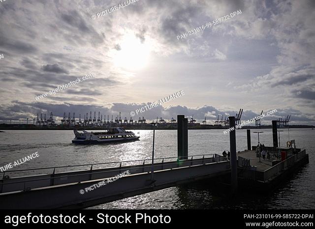 16 October 2023, Hamburg: An excursion boat passes the Dockland pier during a harbor tour on the Elbe River. Photo: Christian Charisius/dpa