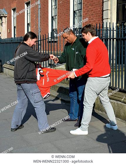 Manchester United legend Paul Ince seen leaving the Merrion Hotel and signing one of his old jerseys for a fan, Dublin, Ireland - 19.03.15