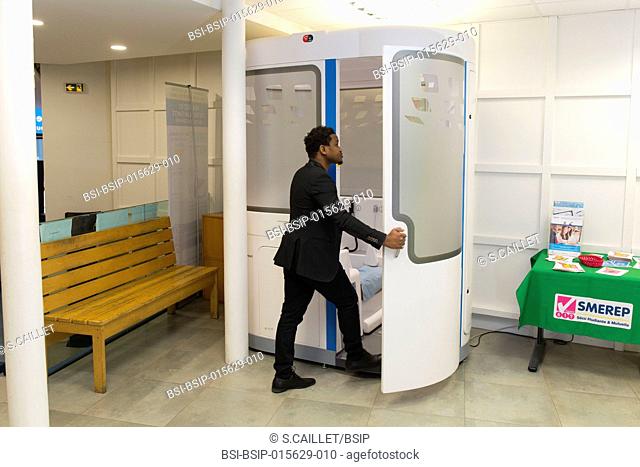 E-health monitoring booth made available for students with student health cover in Paris, France. Students can have a remote check-up, guided by adapted videos