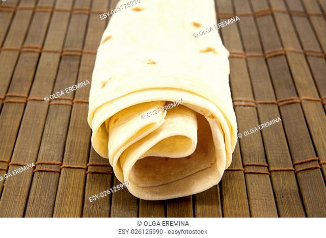 Large thin pita bread, isolated on a white background