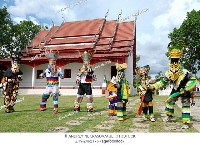 People dressed up with ghost masks and colourful costume. Phi Ta Khon masks Festival, which is annually held in the 7th lunar month (June)