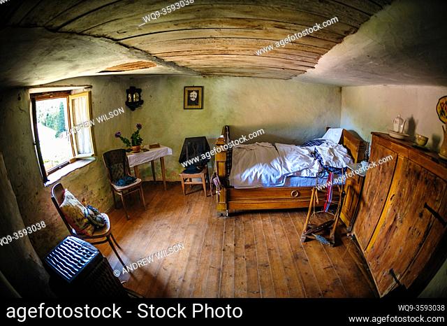 Interior of a troglodyte dwelling in the village of Graufthal, Alsace, France. The houses are built into the cliffs with the rock forming the ceiling and floor