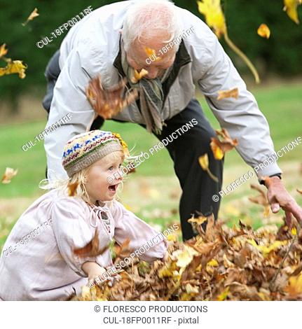 Grandfather and Granddaughter outdoors
