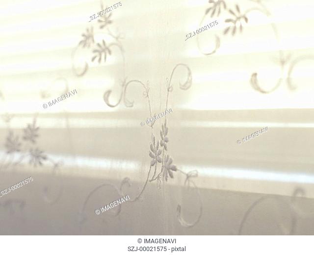 Sheer floral stitching window panel