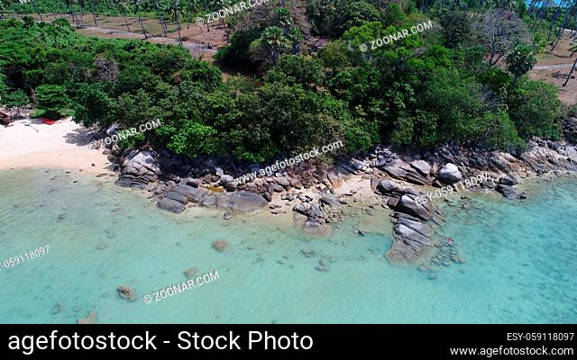 Aerial top view of sea, rocks and coastline of one of the beach in Phuket, Thailand