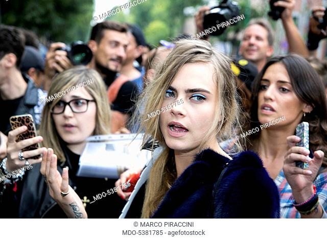 The actress and model Cara Delevingne surrounded by her fans. Milan, Italy. 19th September 2014