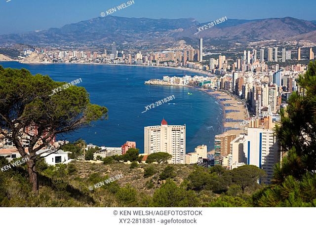 Benidorm, Costa Blanca, Alicante Province, Spain. Overall view showing Levante beach foreground and Poniente beach in background
