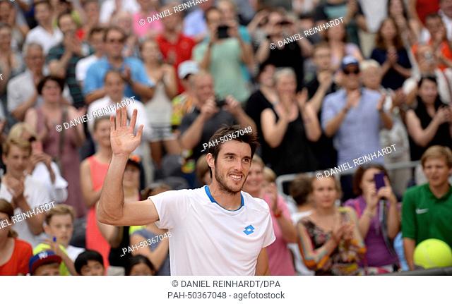 Argentina's Leonardo Mayer celebrates his victory against Spain's Ferrer during the ATP Tour in Hamburg, Germany, 20 July 2014