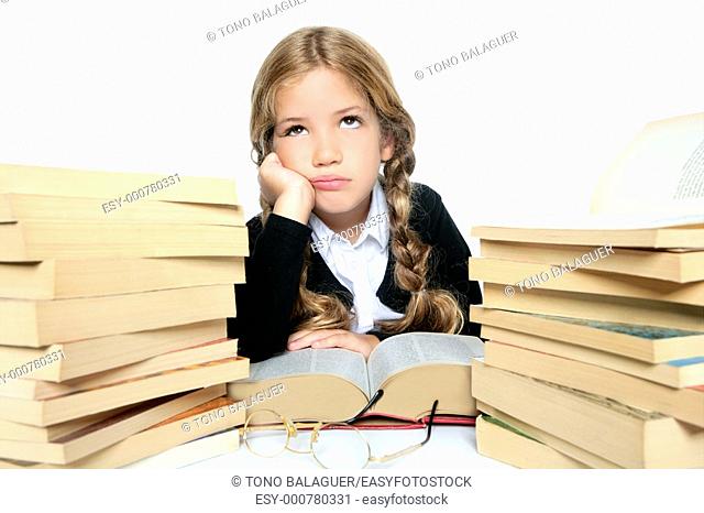 little unhappy sad student blond braided girl bored with stacked books on white background