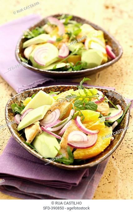 Chicken, avocado and orange salad with rocket and mint