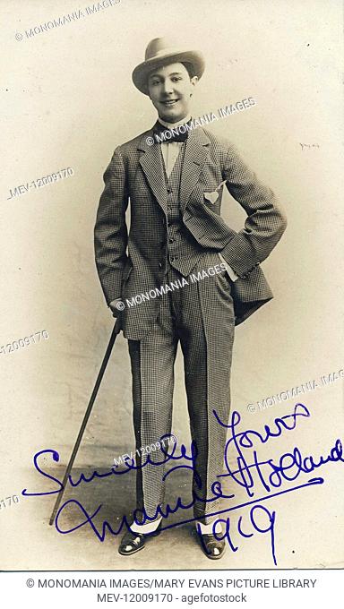 Mamie Holland (Emily Alexander) male impersonator in music hall and musical comedy. Wearing three-piece checked suit with Homburg ('), spats and a cane