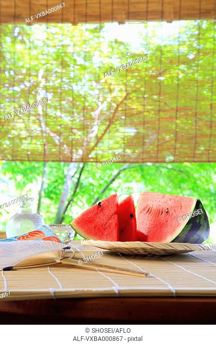 Bamboo blind and watermelon