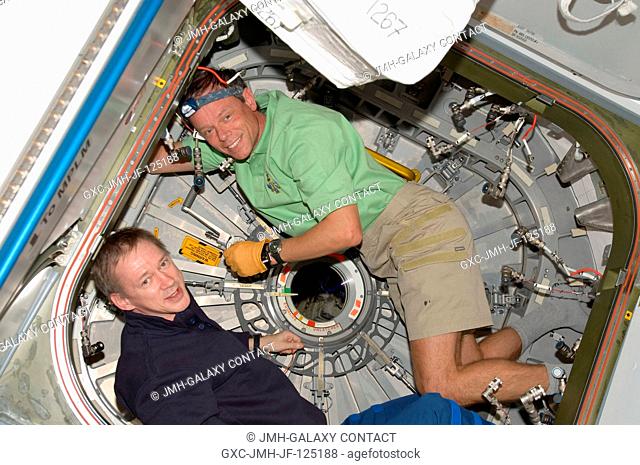 European Space Agency astronauts Frank De Winne (left), Expedition 20 flight engineer; and Christer Fuglesang, STS-128 mission specialist