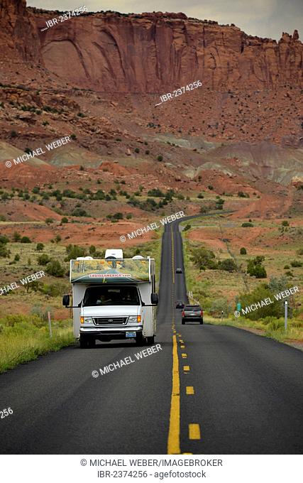 Camper van driving on the U.S. Highway 24, Waterpocket Fold, Capitol Reef National Park, Utah, Southwestern USA