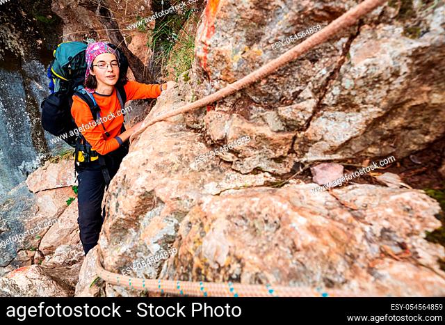 Girl Climber on the rock