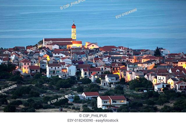 View of the Croatian town Betina at dusk