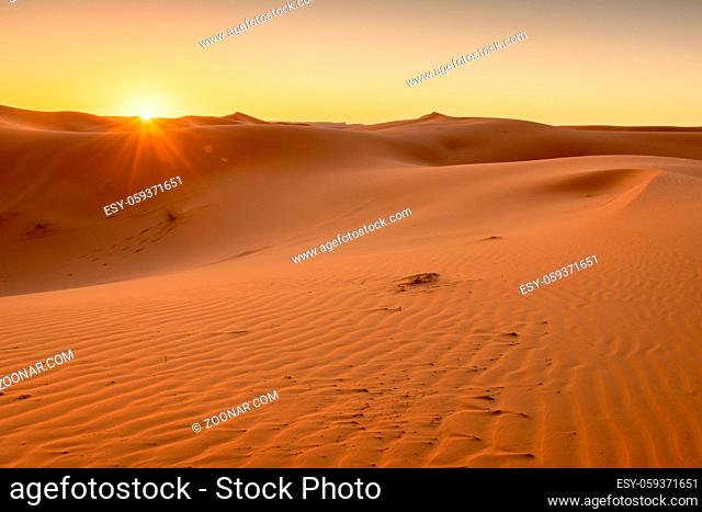 Golden hour Sunrise over the Sahara Dunes, Merzouga, Morocco