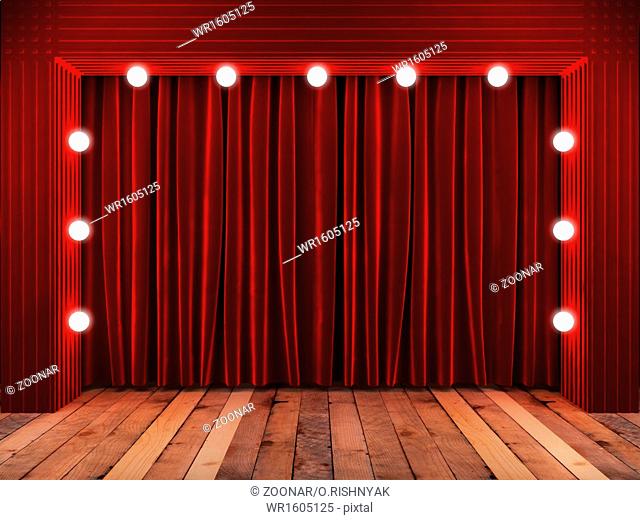 red fabrick curtain on stage