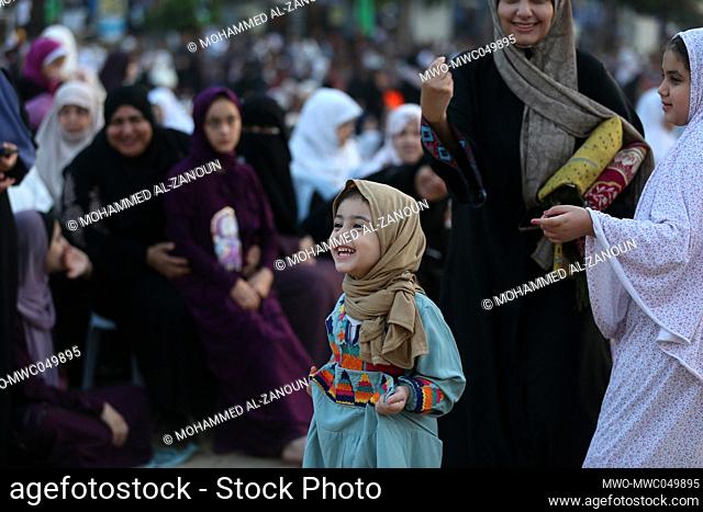 Gaza City, Palestine. 10th July 2022. Palestinian women and children perform the al-Adha feast prayers in Gaza City. The Eid al-Adha, or 'Feast of Sacrifice'