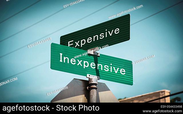 Street Sign the Direction Way to Inexpensive versus Expensive