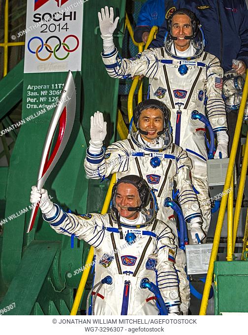 Baikonur Cosmodrome, Kazakhstan. 07 November, 2013. Winter Olympics torch in space. . Expedition 38 Soyuz Commander Mikhail Tyurin of Roscosmos