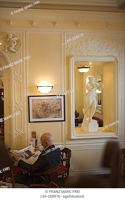 Pensioner, Man reading the newspaper in Cafe Tommaseo, Trieste, Friuli-Venezia Giulia, Upper Italy, Italy