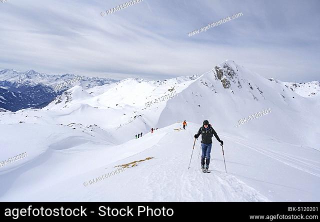 Ski tourers in the snow, ascent to the Klammspitzen, behind Mölser Sonnenspitze, Wattentaler Lizum, Tuxer Alps, Tyrol, Austria, Europe