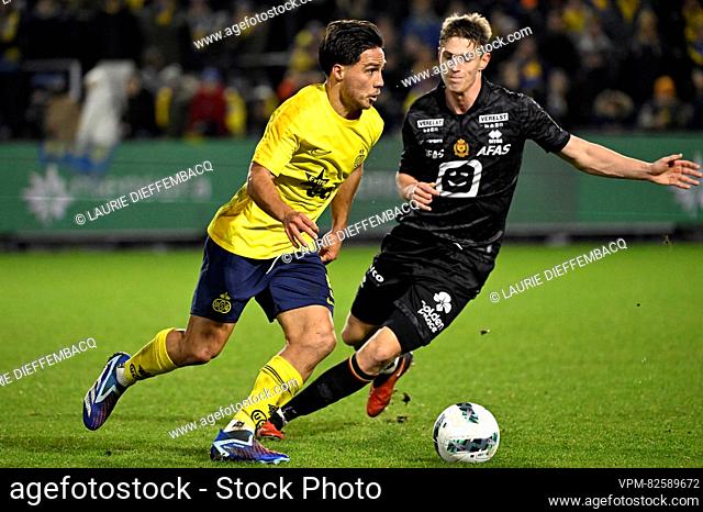Union's Kevin Mac Allister and Mechelen's Lion Lauberbach pictured in action during a soccer match between Royale Union Saint-Gilloise and KV Mechelen