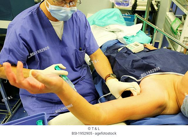 LOCAL ANESTHESIA<BR>Photo essay from hospital.<BR>Orthopedic clinic. Local anesthesia before the surgery of the carpal tunnel