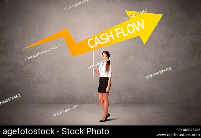 Young business person in casual holding road sign with CASH FLOW inscription, business direction concept