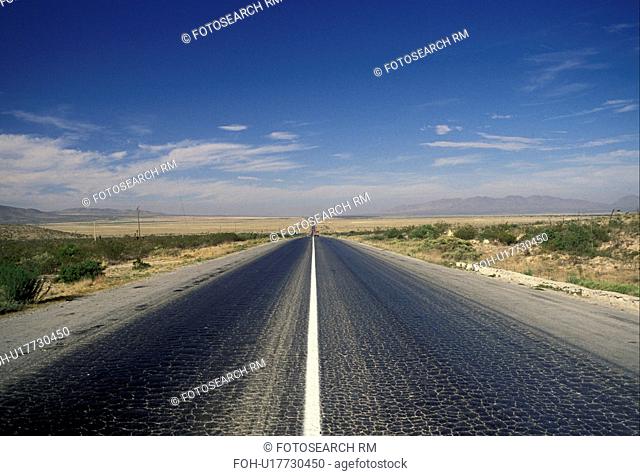 road, highway, Mexico, Route 57 stretches for miles in the barren flat land of Sierra Madre Oriental