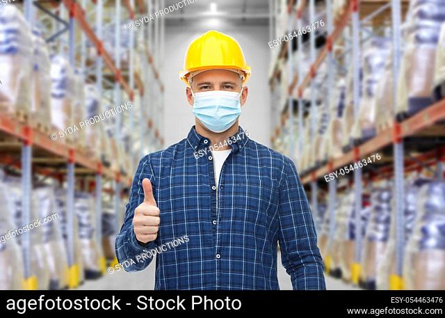 male worker wearing face mask at warehouse