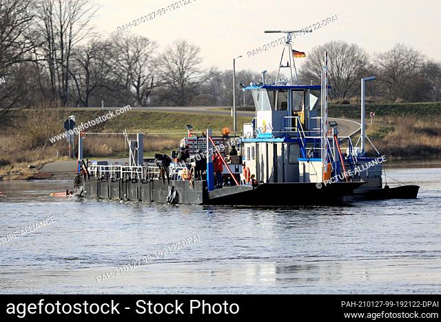 27 January 2021, Saxony-Anhalt, Sandau: After almost one year of standstill, the ferry ""Sandau"" transports customers across the Elbe again