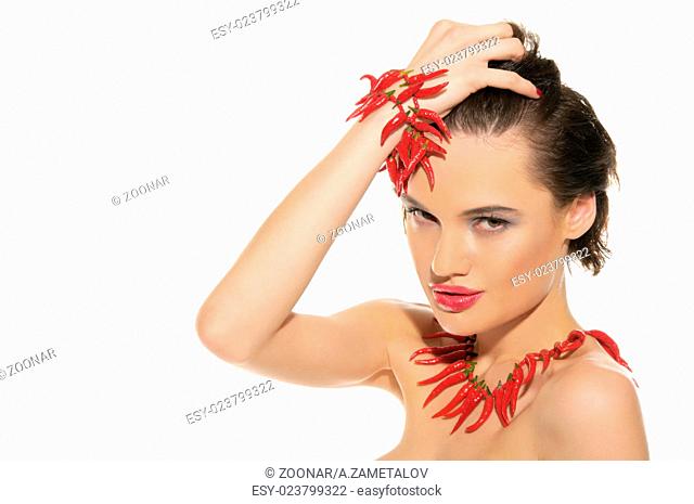Sexy woman with jewelry of red hot pepper