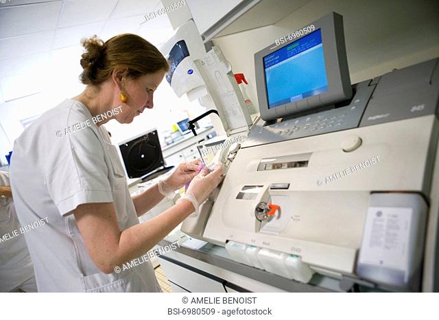 Photo essay at the hospital of la Croix Saint-Simon, Paris, France. Laboratory. Device to measure gas in the blood gazometry