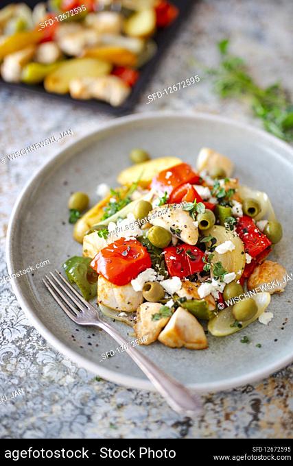 Turkey breast fillet with peppers, olives and sheep's cheese from a tray