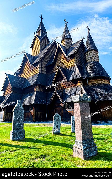 Norway, Notodden, Heddal, Tombstones in front of Heddal Stave Church