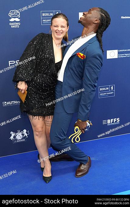 03 September 2021, Berlin: Actor Eugene Boateng receives the German Acting Award 2021 in the category ""Actor Leading Role"" and actress and laudator Jasna...