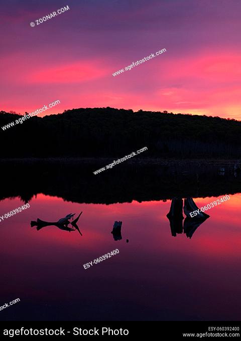 silhouette image of mountain and lake