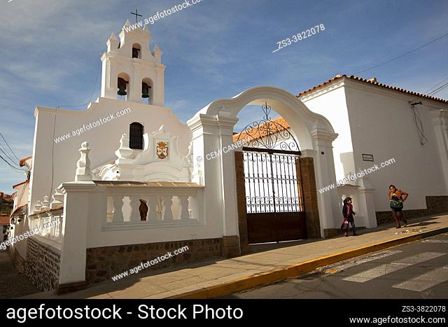 Mother and child in front of the Convent Of Santa Teresa-Convento Santa Teresa in the historic center, Sucre, Chuquisaca Department, Bolivia, Souty America