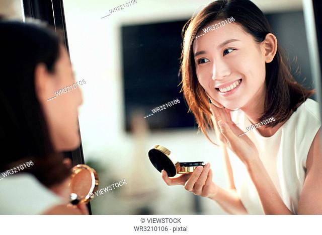 Young beauty makeup powder