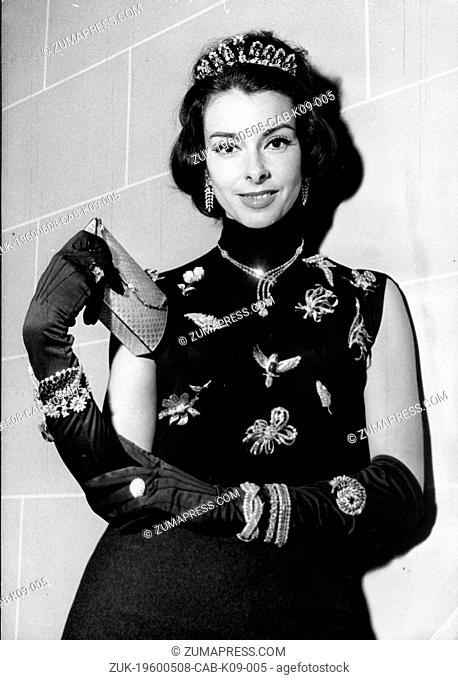 Dec. 21, 1959 - Paris, France - Model FABIENNE SHINE wearing some of the jewels that value 200 million francs at a fashion show
